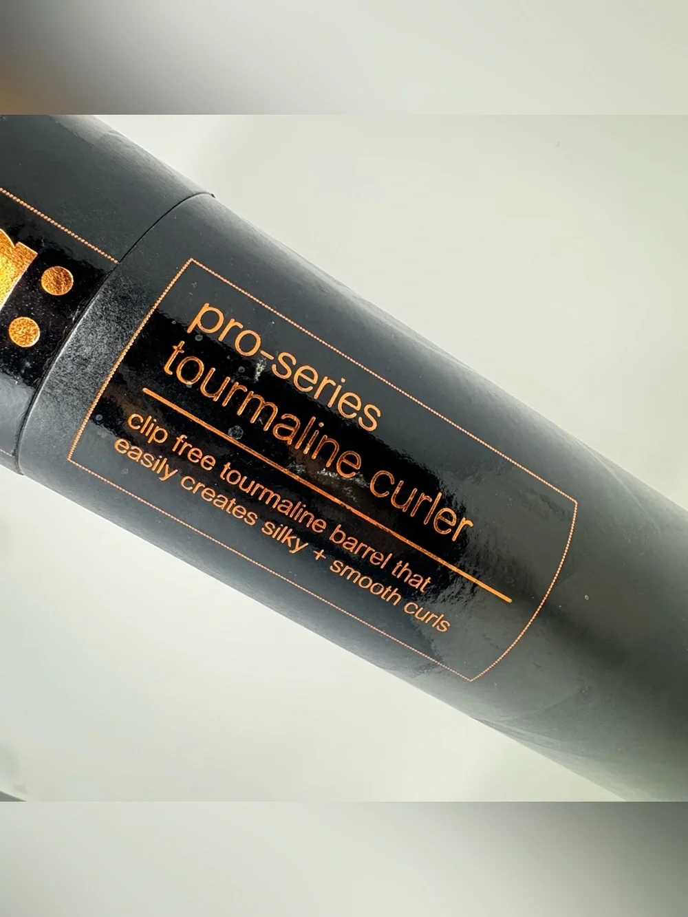Amika: pro-series tourmaline curler 19mm. Never used. Comes with heat glove.